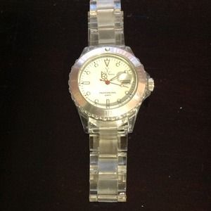 Clear with pink rimmed face Toy watch.