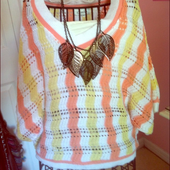 ⬇Oversized knitted chevron short sleeved sweater