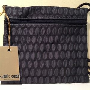 A small black Maruca designer sling bag.