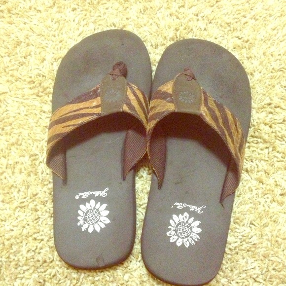 Brown zebra yellow box flip flops