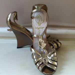 Baby Phat wedges size 6.5 hardly worn.