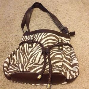 Never used, animal print handbag.
