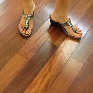 Black sandal with silver sequins.