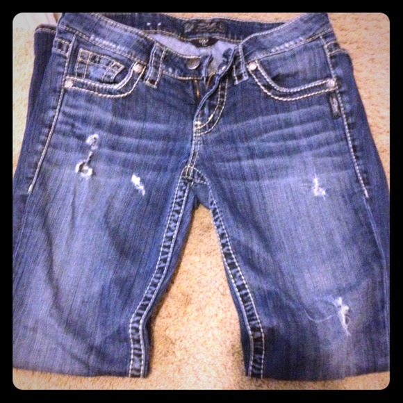 Silver jeans.