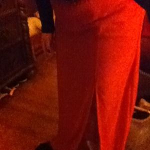 Long orange skirt with messed up zipper
