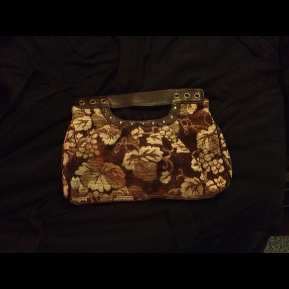 Cream/Brown clutch with handle.