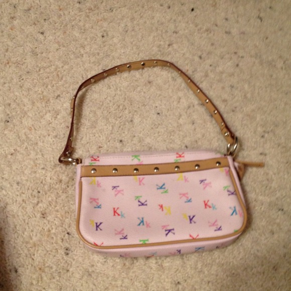 A pink limited too small purse
