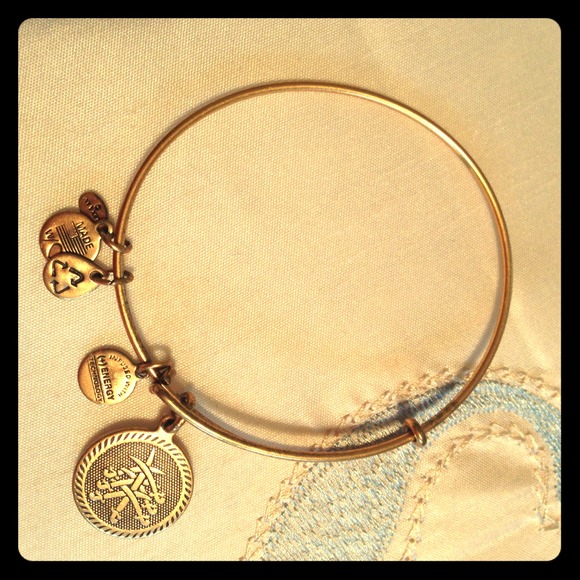 SOLD !!! Alex and Ani gold Swords bracelet