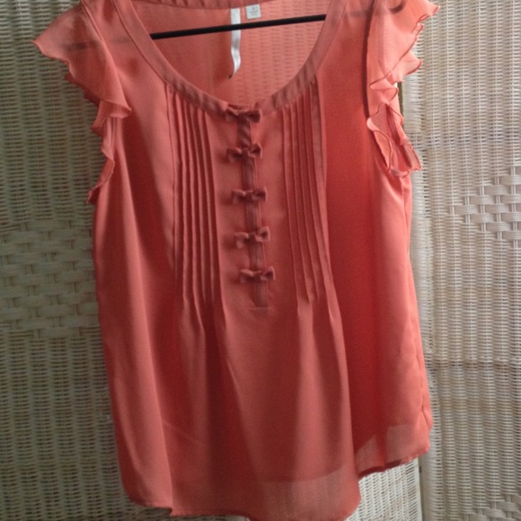 Semi-Sheer Sleeveless Top with Bow Detailing