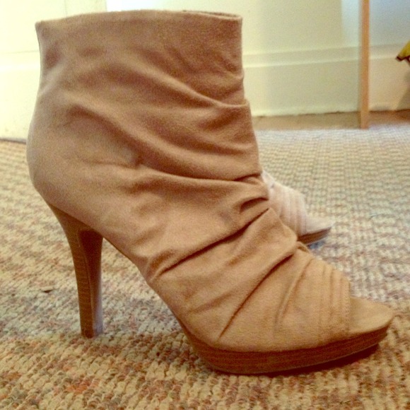 Size 9. Tan open-toe booties. Gently used