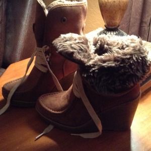 Wedge hiking booties and brown vest