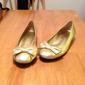 Metallic gold flats.