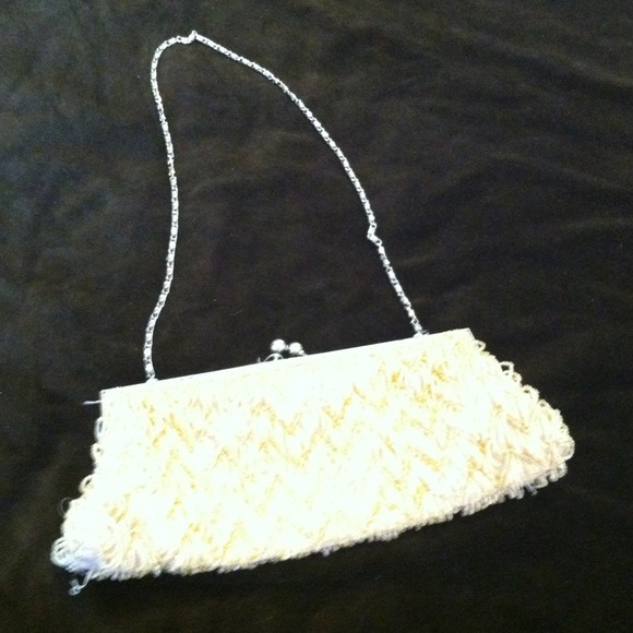 Gold beaded cluth with snap and strap