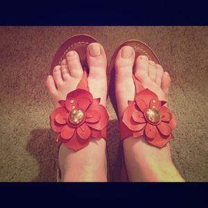 Coach orange sandals with flower and stud