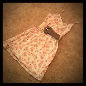 Super cute floral dress with peek-a-boo back