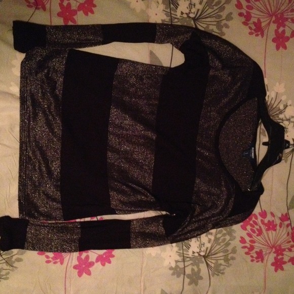 Black and silver shirt and brown and black sandals