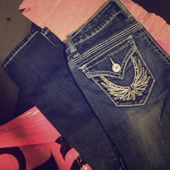 Vanity dark wash angel wing skinnys