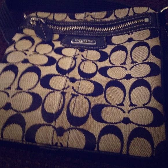 Gently used black and grey Coach Cross body Bag 👜