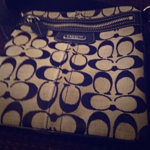 Gently used black and grey Coach Cross body Bag 👜
