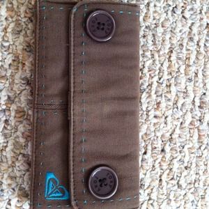 Brown roxy wallet with teal details