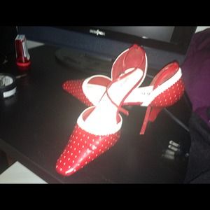 Red and white pumps with ankle strap