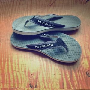 Grey and black Burberry flip flops