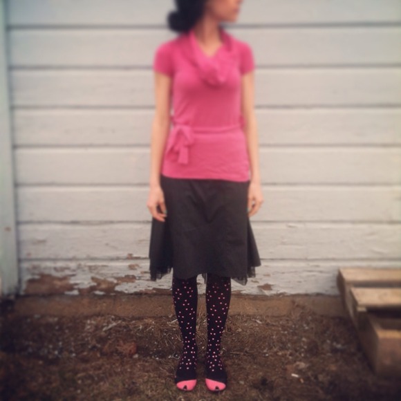 Pink fall tight knitted top.