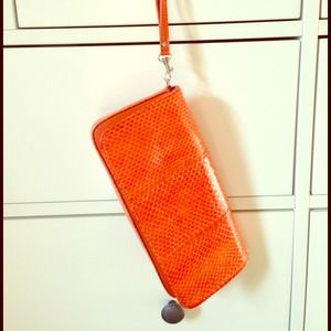 Orange snakeskin clutch/wristlet - Giani Bernini
