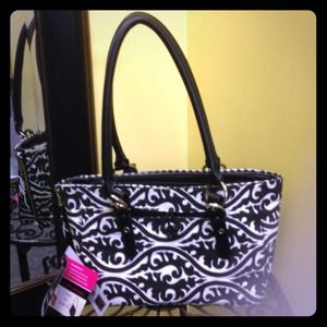 Luvali convertible handbag and extra cover