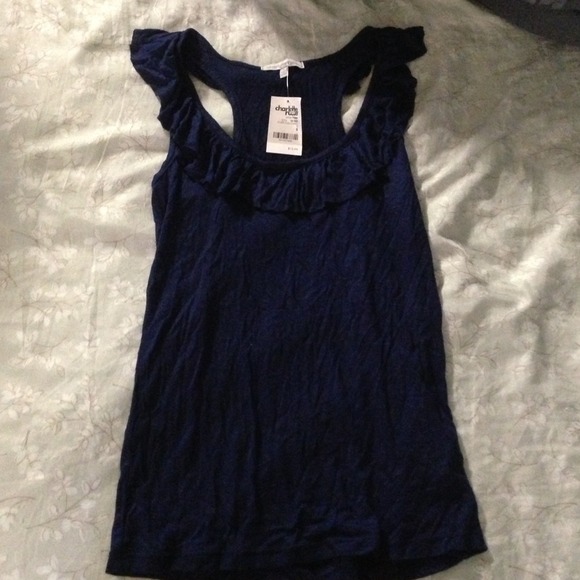 Navy ruffled top. SOLD