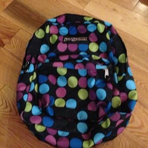 Gently used jansport polka dot backpack