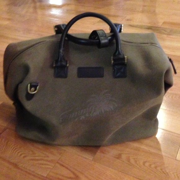 Gently used tommy Bahamas luggage bag