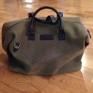 Gently used tommy Bahamas luggage bag