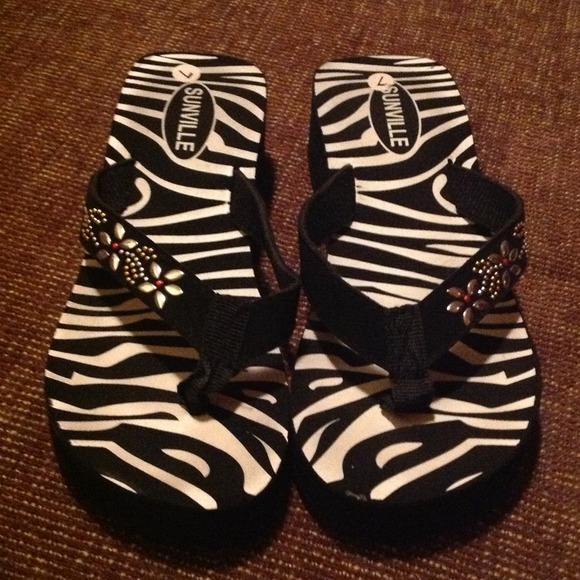 Size 7 jeweled Flip flops