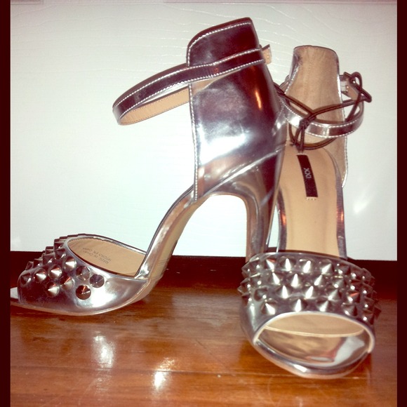 Soldd ... Silver heels with spikes embellishments