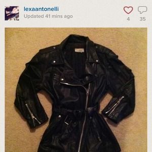 Black woman's leather motorcycle jacket