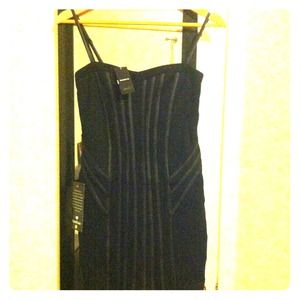 Bebe black cocktail dress. Brand new.
