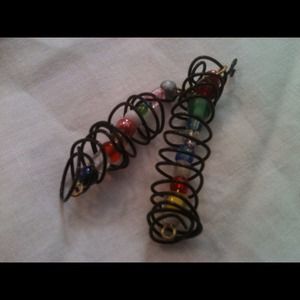 Wire wrapped small glass earrings.