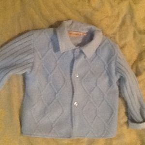 Child's cabled acrylic sweater -new condition
