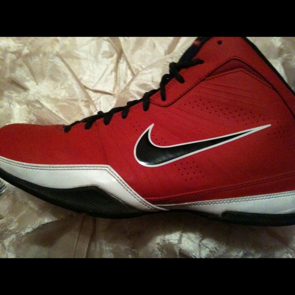 Red white and black Nike basketball sneakers