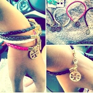 Tory Burch black and pink bracelets and earrings