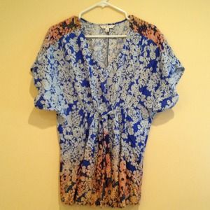 A fun tie front "Hippee tunic" by CABI in rayon.