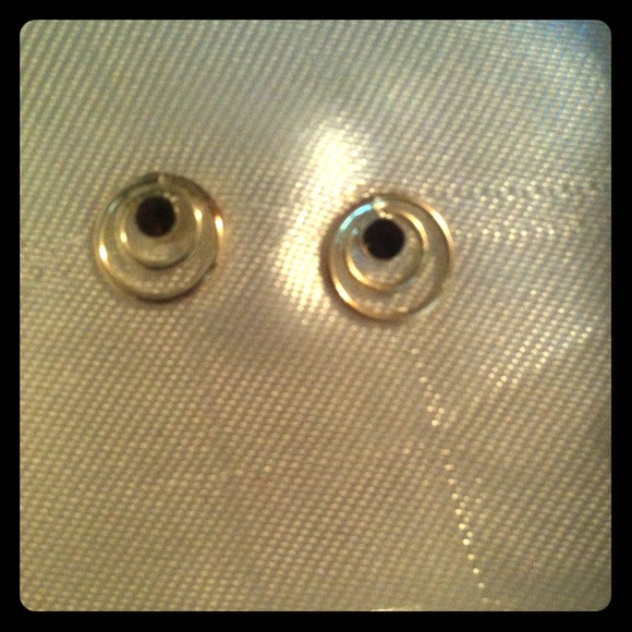 Purple crystal stud earrings.