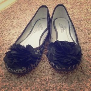 black cheetah print shoes with flower