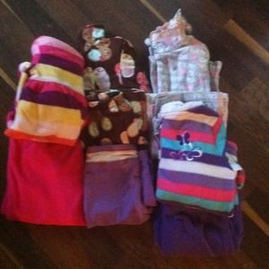 2 fleece outfits, 2 PJ sets, yoga pants.