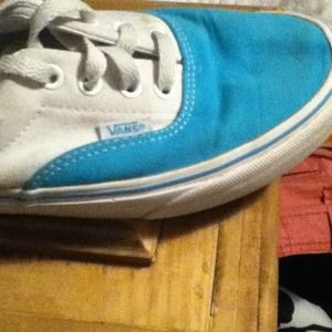 Turquoise and white vans