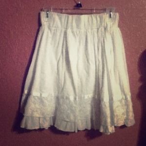 White skirt with embroidered and silk accent