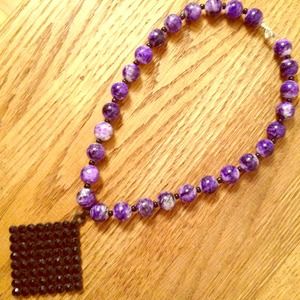Purple glass bead necklace