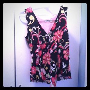 Very cute! Sleeveless top.