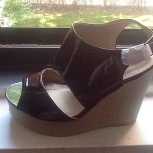 Patten leather wedges